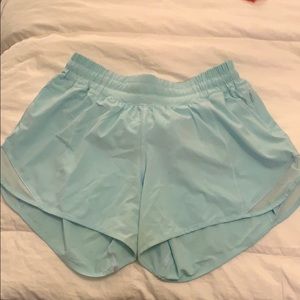 Light blue lululemon hotty hot shorts tall.